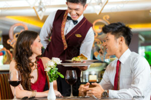 chinese-waiter-serving-dinner-elegant-539170